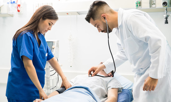 Doctors examining a patient